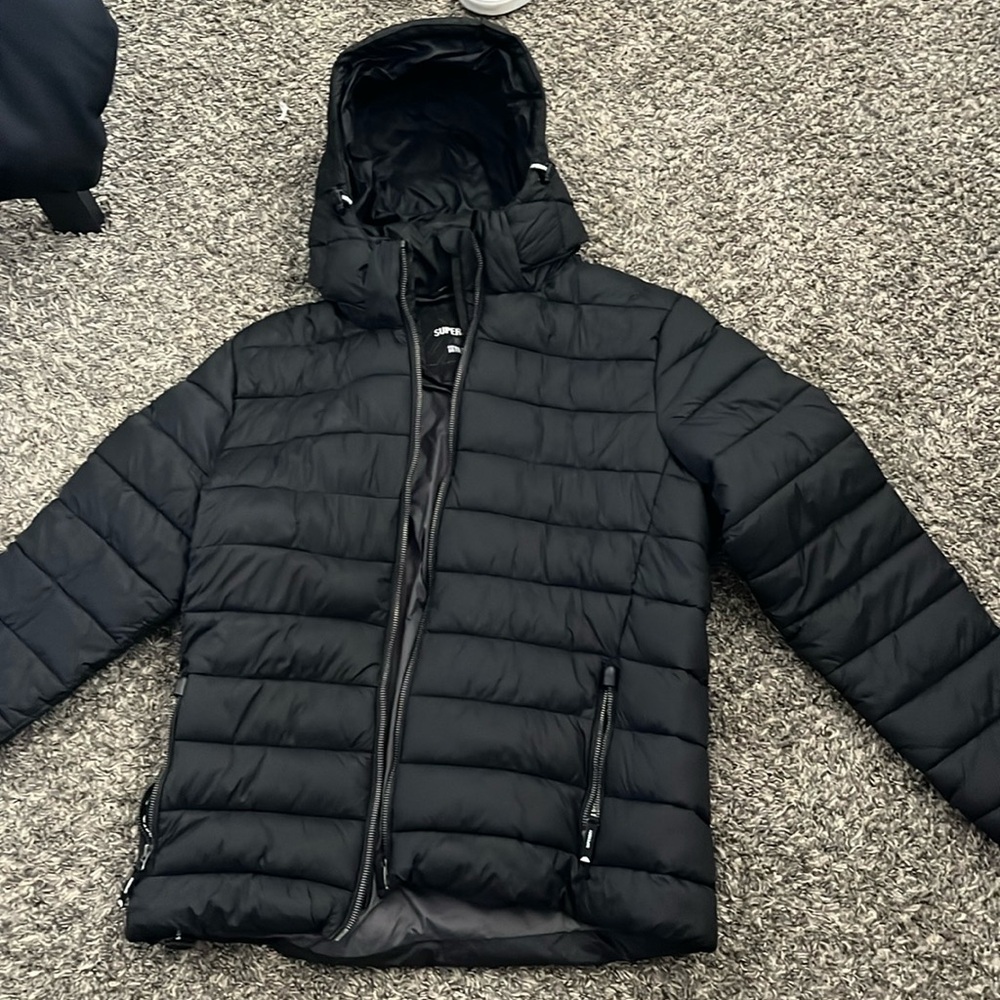 The brand is superdry, the size is large in men’s